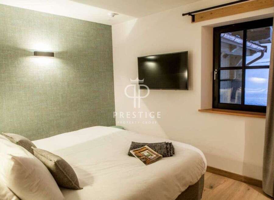 Discover the epitome of comfort in this stylish bedroom.
