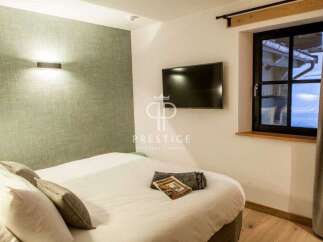 Discover the epitome of comfort in this stylish bedroom.