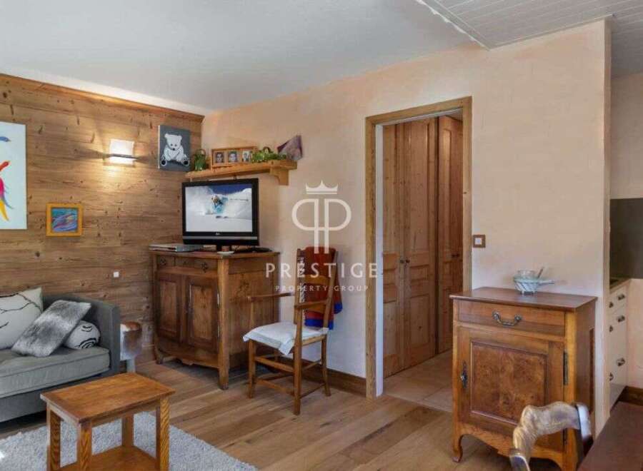Discover the charm of this cozy property, featuring a warm wooden interior and a welcoming atmosphere.