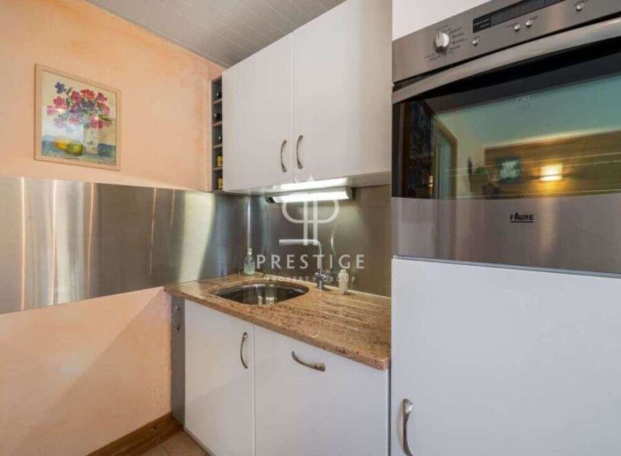 Discover a charming kitchen space, perfect for culinary enthusiasts.