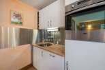 Discover a charming kitchen space, perfect for culinary enthusiasts.
