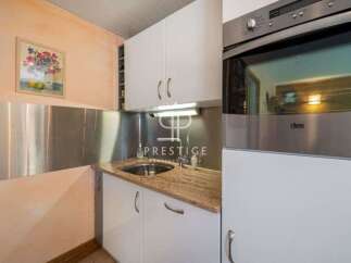 Discover a charming kitchen space, perfect for culinary enthusiasts.