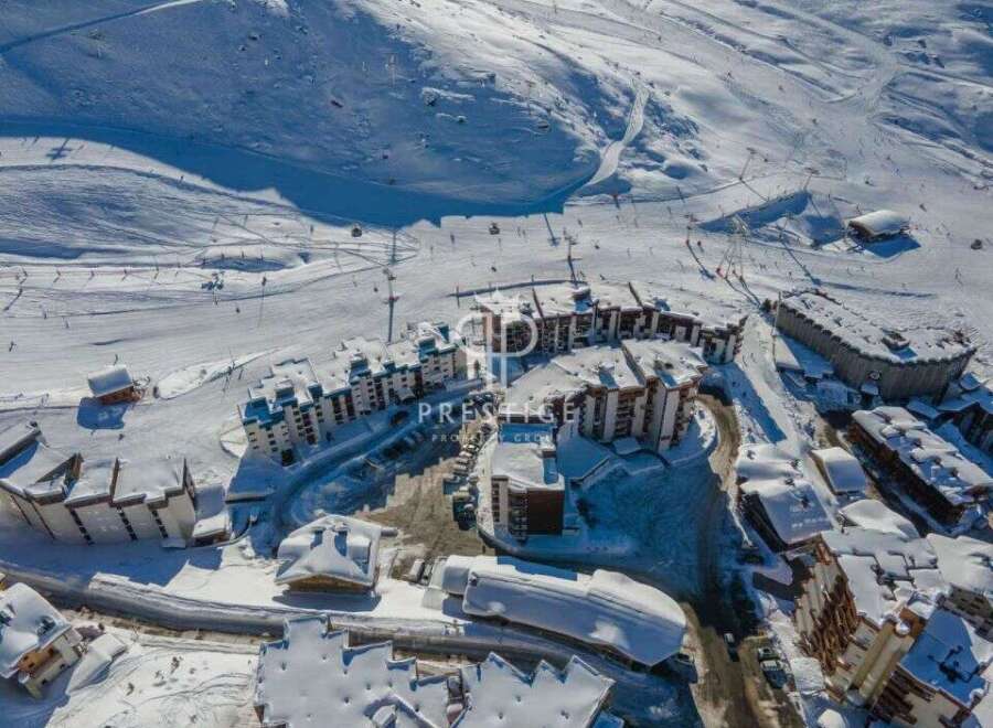 Discover a stunning property nestled in a picturesque snowy landscape.