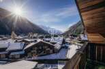 Experience breathtaking mountain views from this stunning property.