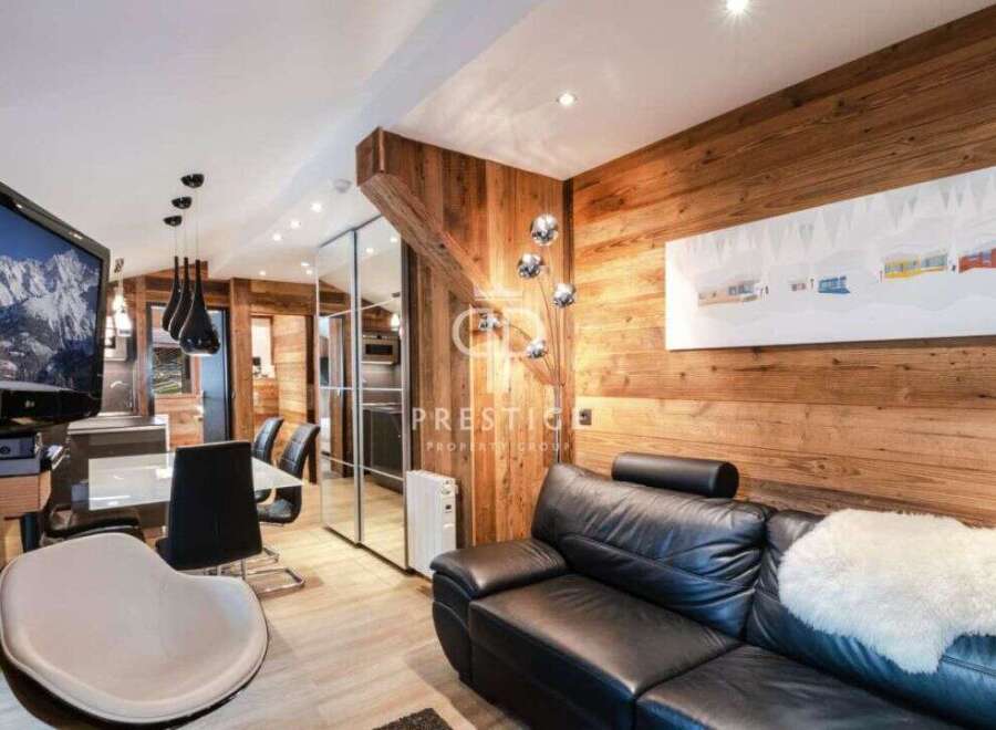 Experience luxury living in this stunning property, featuring a modern design with a touch of rustic charm.
