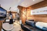 Experience luxury living in this stunning property, featuring a modern design with a touch of rustic charm.