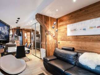 Experience luxury living in this stunning property, featuring a modern design with a touch of rustic charm.