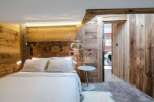 Experience rustic elegance in this stunning bedroom.