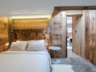Experience rustic elegance in this stunning bedroom.