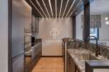 Discover modern luxury in this stunning kitchen.