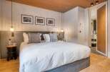 Experience luxury in this stunning bedroom.