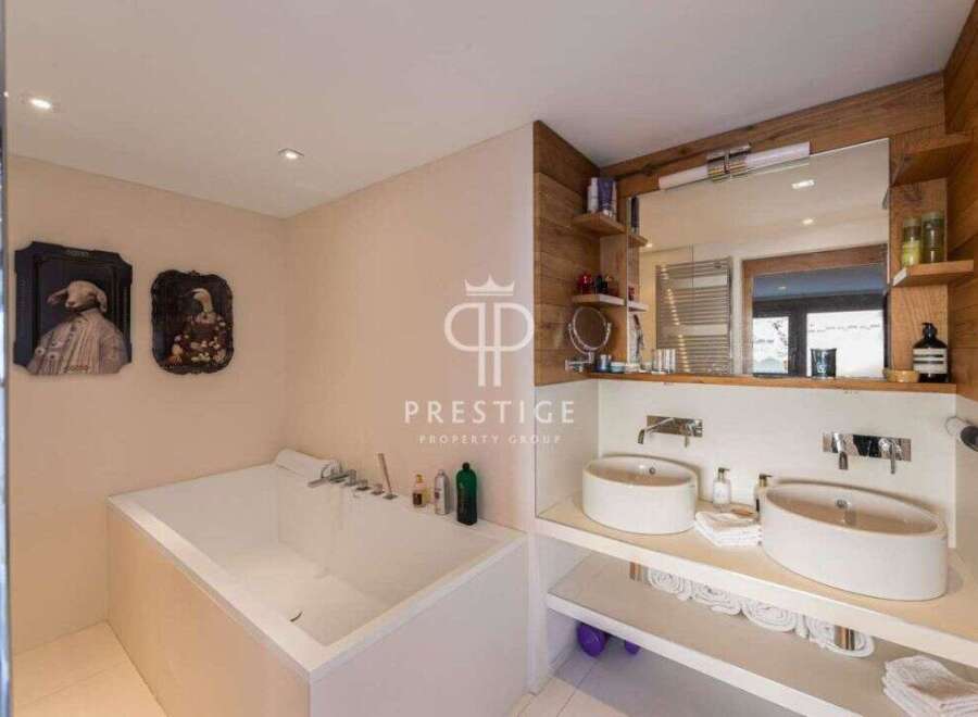 Discover luxury living in this stunning property! Featuring a modern bathroom with a sleek design, this home offers a spa-like experience.