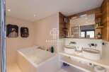 Discover luxury living in this stunning property! Featuring a modern bathroom with a sleek design, this home offers a spa-like experience.
