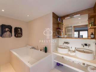 Discover luxury living in this stunning property! Featuring a modern bathroom with a sleek design, this home offers a spa-like experience.