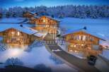 Experience the ultimate in luxury living with these stunning chalets nestled in a winter wonderland.