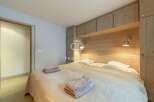 Discover the epitome of comfort in this stunning bedroom.