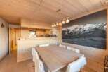 Experience the warmth of this stunning property, featuring exquisite wooden interiors and a cozy ambiance.