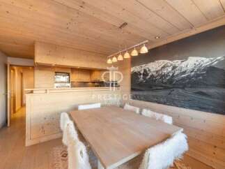 Experience the warmth of this stunning property, featuring exquisite wooden interiors and a cozy ambiance.
