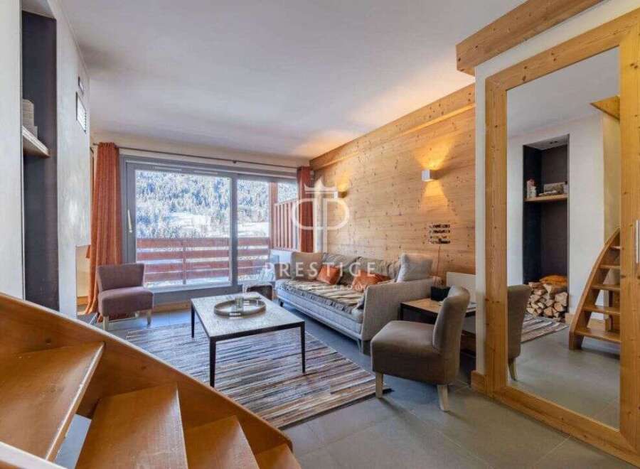 Discover a cozy living space with a stunning view.