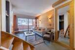 Discover a cozy living space with a stunning view.