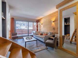 Discover a cozy living space with a stunning view.