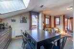 Discover a stunning property with a modern dining area, perfect for entertaining.