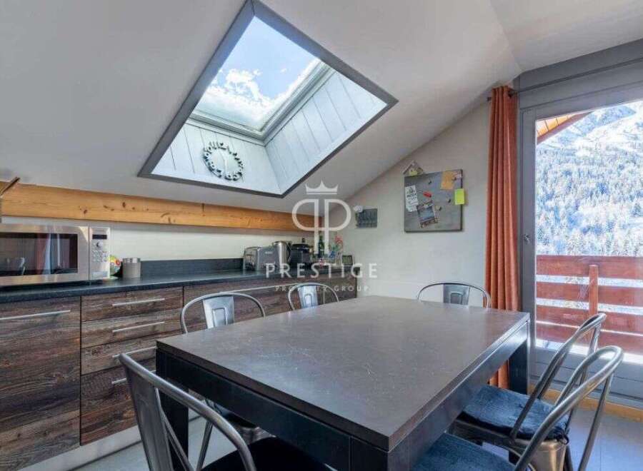 Discover a stunning property with a unique skylight, offering breathtaking views.