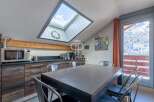 Discover a stunning property with a unique skylight, offering breathtaking views.