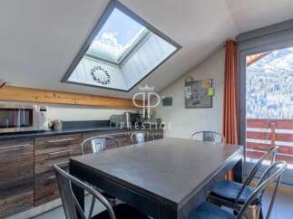 Discover a stunning property with a unique skylight, offering breathtaking views.