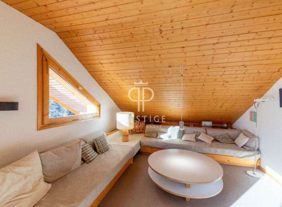 Discover a cozy living space with a unique architectural design.