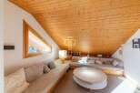 Discover a cozy living space with a unique architectural design.