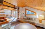 Discover the charm of this stunning property, featuring a unique architectural design with exposed wooden beams and a cozy, inviting atmosphere.