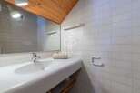Discover a stylish bathroom with a modern sink and elegant fixtures.