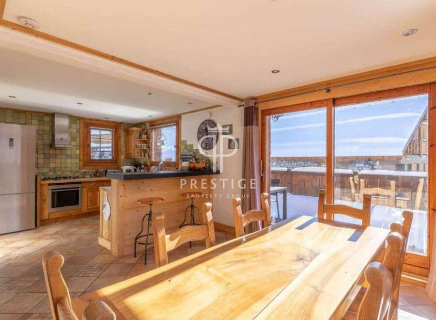 Experience the charm of this stunning property, featuring a beautifully designed kitchen and dining area.