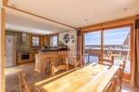 Experience the charm of this stunning property, featuring a beautifully designed kitchen and dining area.