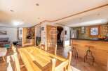 Discover the charm of this stunning property, featuring a spacious dining area perfect for gatherings.