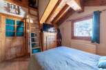 Discover the charm of this cozy mountain retreat, featuring rustic wooden accents and a warm, inviting atmosphere.