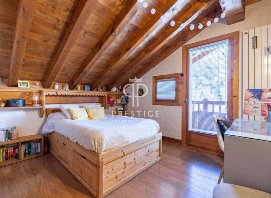 Discover a charming bedroom with a rustic wooden design.