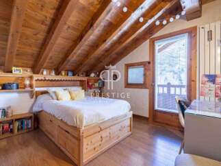 Discover a charming bedroom with a rustic wooden design.