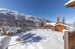 Experience the ultimate winter escape in this stunning property nestled amidst a snowy landscape.