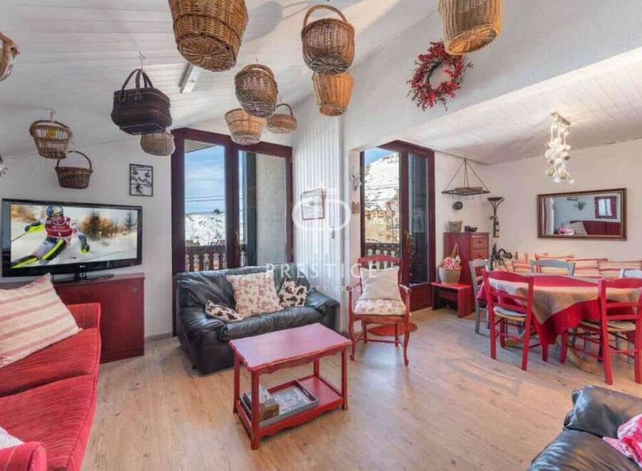 Charming alpine retreat with stunning mountain views.