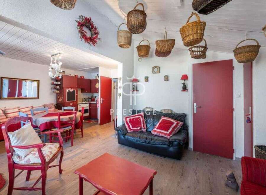 Discover the charm of this unique property, featuring a cozy living space with a touch of rustic elegance.