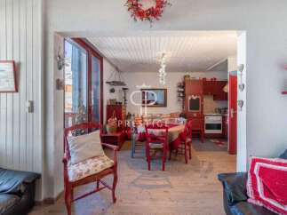 Discover the charm of this cozy property, featuring a warm and inviting interior.