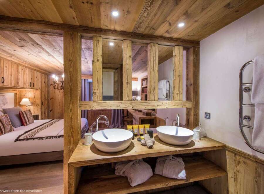 Experience rustic luxury in this stunning chalet-style bathroom.