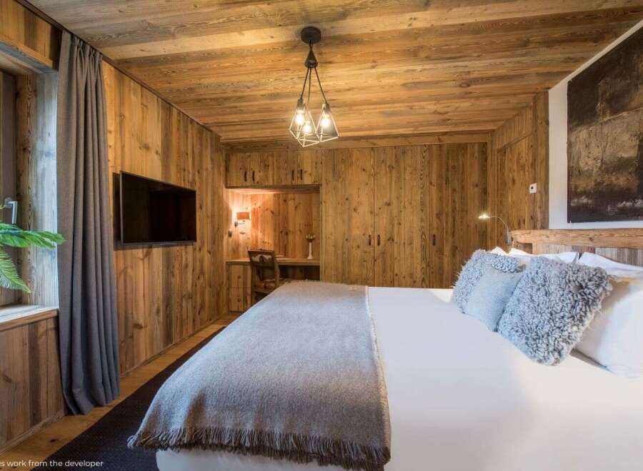 Experience rustic elegance in this stunning bedroom.