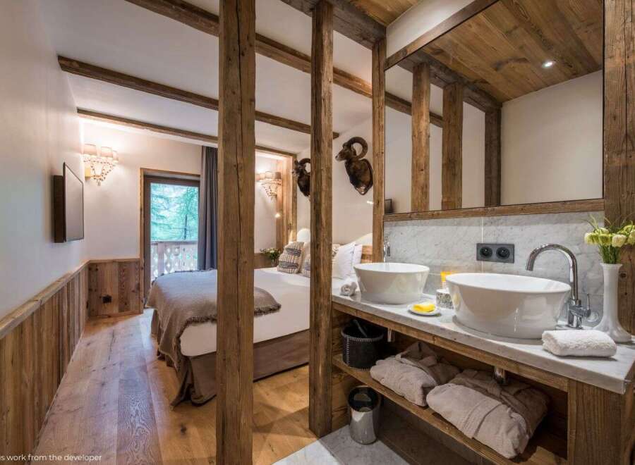 Experience rustic luxury in this stunning property, featuring exquisite wooden beams and a seamless blend of comfort and style.