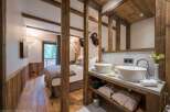 Experience rustic luxury in this stunning property, featuring exquisite wooden beams and a seamless blend of comfort and style.