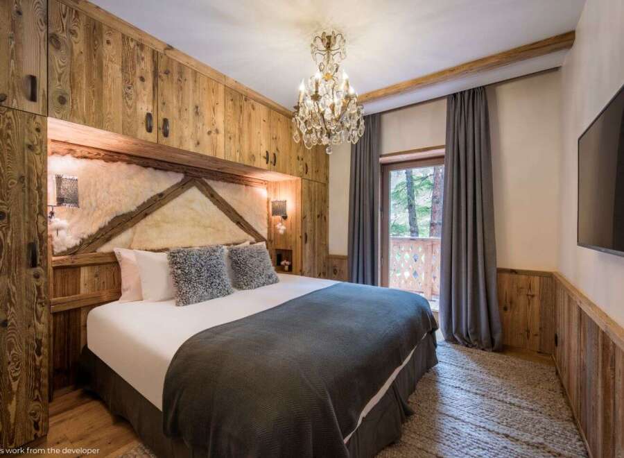 Experience rustic elegance in this stunning bedroom.