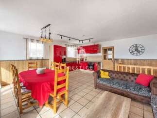 Discover this stunning property featuring a modern red kitchen, perfect for culinary enthusiasts.