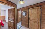 Discover the rustic charm of this property, featuring stunning wooden doors and walls that exude warmth and character.